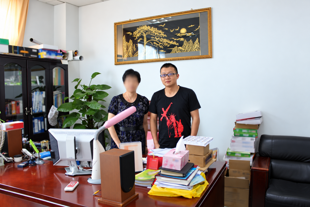Harry Lee visiting a reading pen factory office in Shenzhen in 2012 with supplier details anonymised