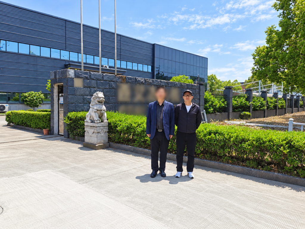 Harry Lee visiting an elevator traction machine factory in Suzhou Jiangsu in 2023