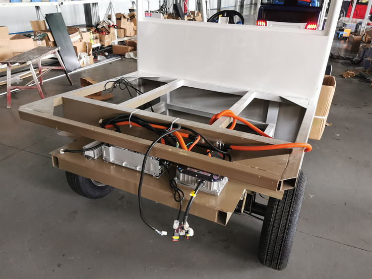 Electric van chassis wiring and control components during assembly