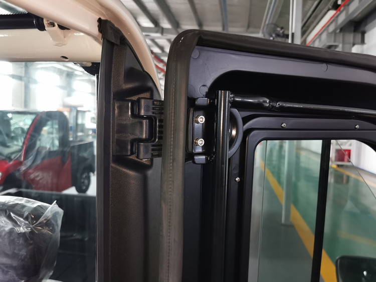 Electric van door hinge mounting and seal inspection