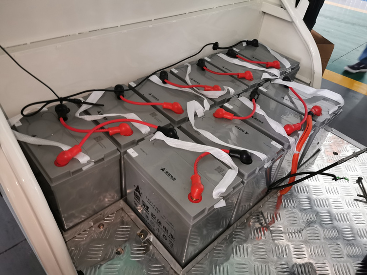 Electric van battery installation cable and terminal inspection