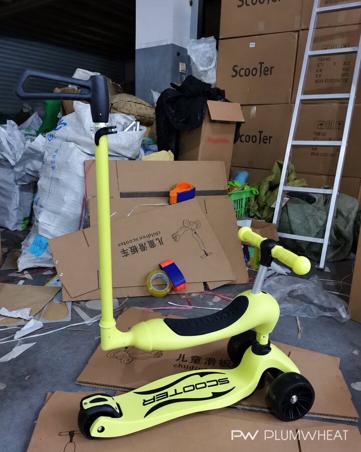 Three-in-one children's scooter displayed at a supplier facility in China.