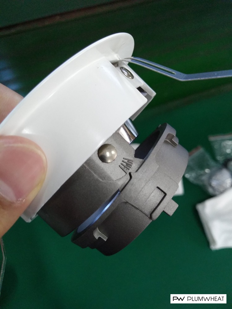 Close-up of the downlight housing adjustment joint and mounting frame