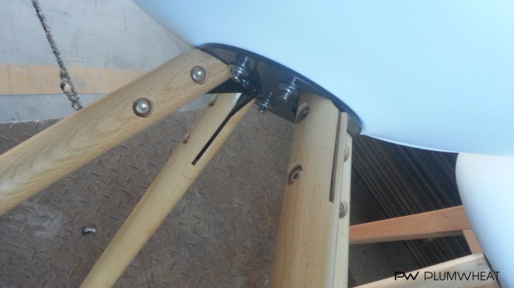 Close-up of PW818 round wooden leg connection and support bracket