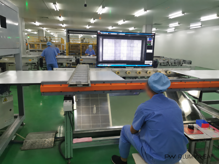 Solar module imaging inspection station reviewed during a factory audit in China